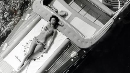 Sofia Loren relaxes on the deck of her Aquarama