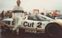 Andy Wallace stands proudly beside his 1988 Le Mans-winning XJR-9